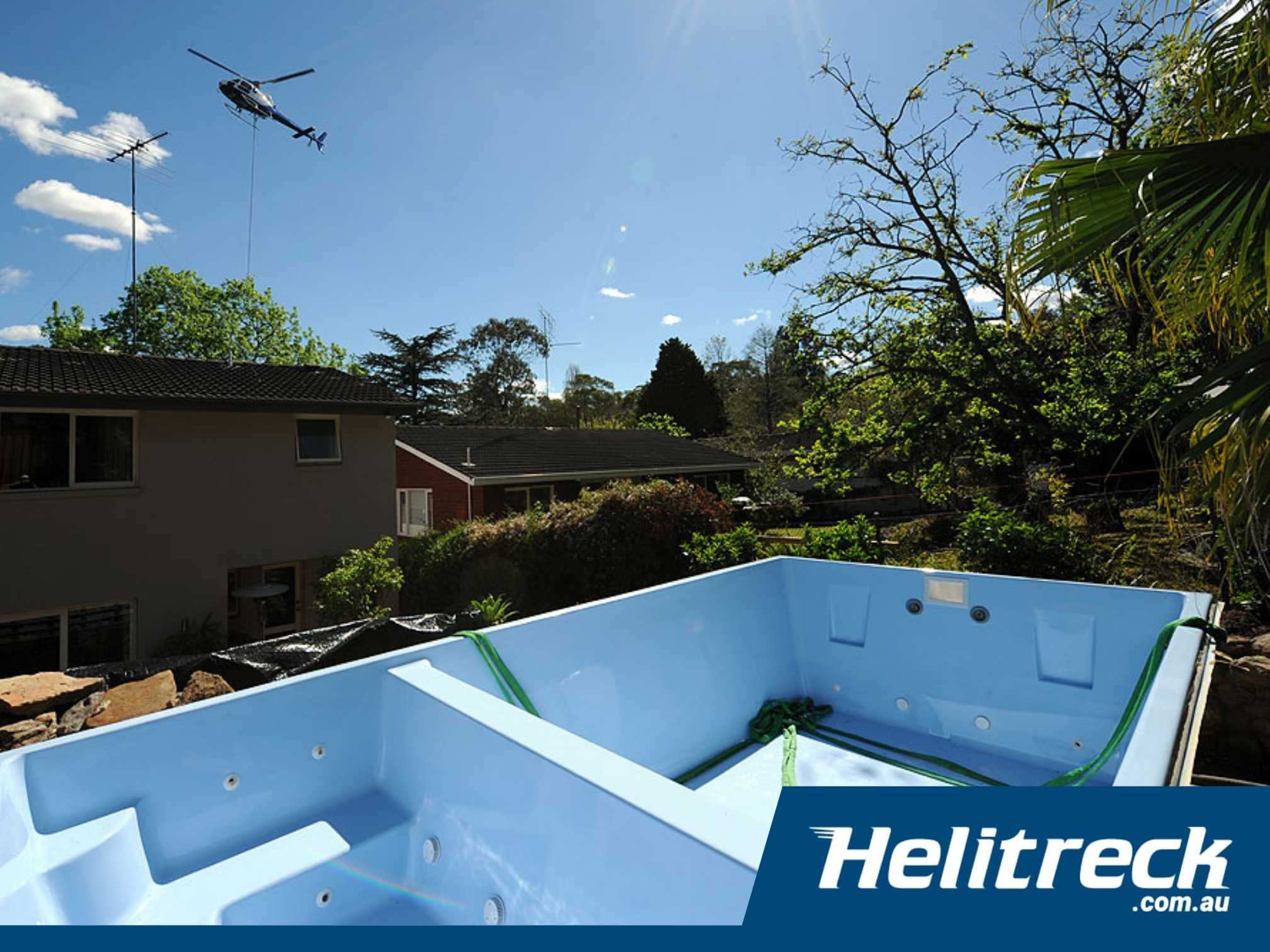 Helicopter-Crane-Helitreck-2 Helicopter crane installing a spa pool